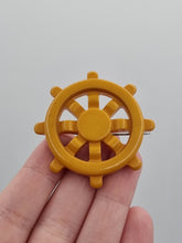 Load image into Gallery viewer, 1940s Butterscotch Bakelite Ships Wheel Brooch
