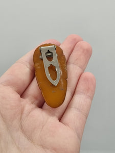 1940s Dark Marmalade Carved Bakelite Dress Clip