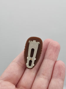 1940s Small Chocolate Brown Carved Bakelite Dress Clip