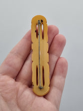 Load image into Gallery viewer, 1940s Butterscotch Bakelite Bar Brooch

