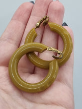 Load image into Gallery viewer, 1940s Olive Green/Mustard Carved Bakelite Earrings
