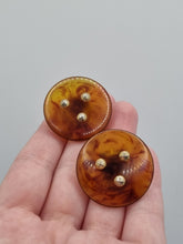 Load image into Gallery viewer, 1940s/1940s Torty Effect Studded Bakelite Clip Earrings
