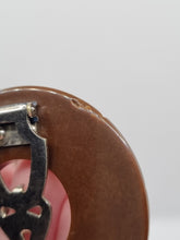 Load image into Gallery viewer, 1940s Chocolate Brown Bakelite Circle Dress Clip
