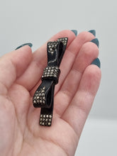 Load image into Gallery viewer, 1930s Art Deco Celluloid 3D Bow Brooch
