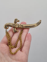 Load image into Gallery viewer, 1940s RARE Stamped Coro Pegasus Sword Scimitar Chain Brooch
